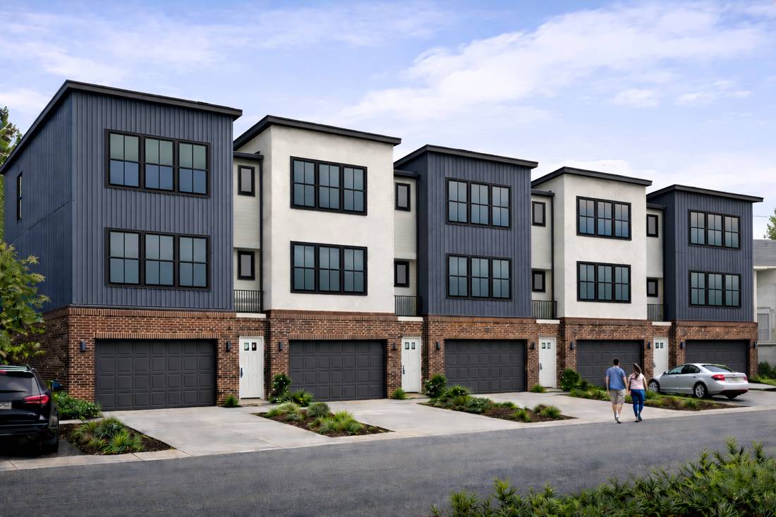 Rendering of the BCS Urban Living townhome street elevation, three stories in charcoal board-and-batten and white stucco over a brick base